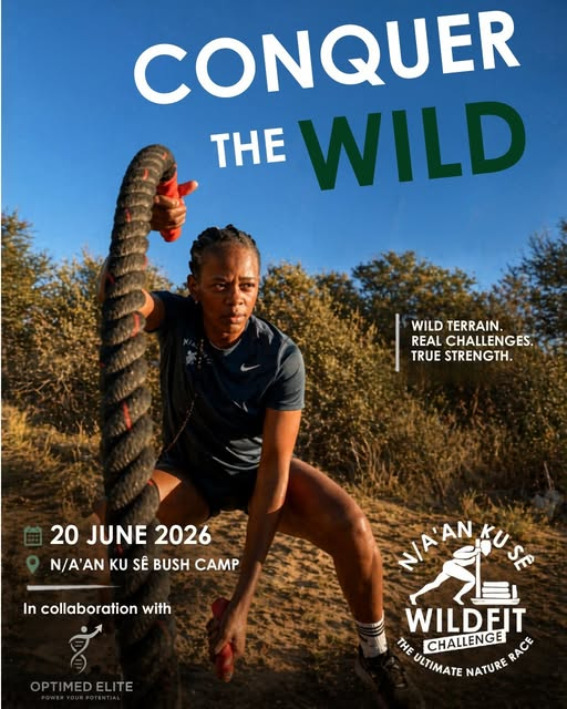 Athlete training with battle ropes on wild terrain for the Na’an ku sê Wildfit Challenge. Headline: Conquer the Wild.